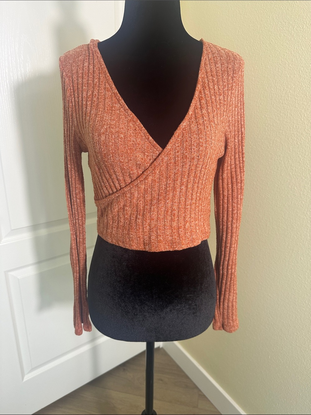 Orange long sleeve ribbed sweater wrap top. Dancer.